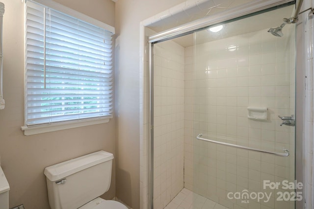 7320 Ritter Dr, Charlotte, NC 28270 - bathroom with a shower stall and toilet