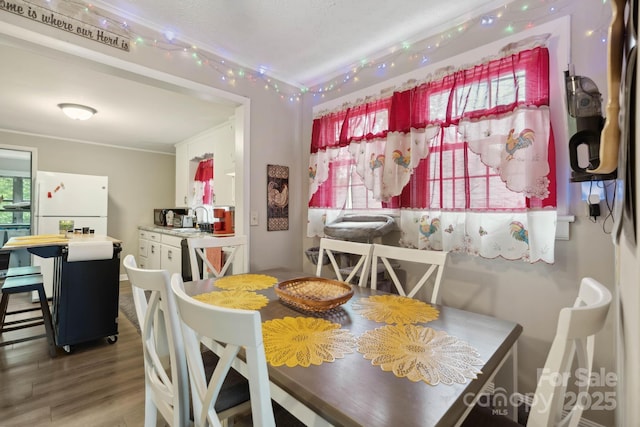 1425 3rd Street Pl NE, Hickory, NC 28601 - dining space featuring wood finished floors and crown molding
