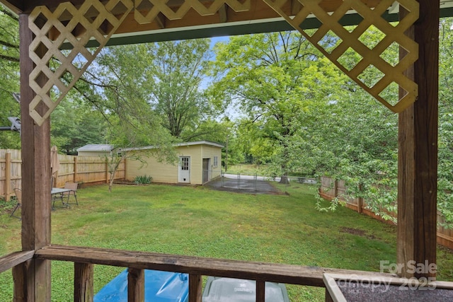 1425 3rd Street Pl NE, Hickory, NC 28601 - view of yard featuring an outdoor structure and view of wooded area