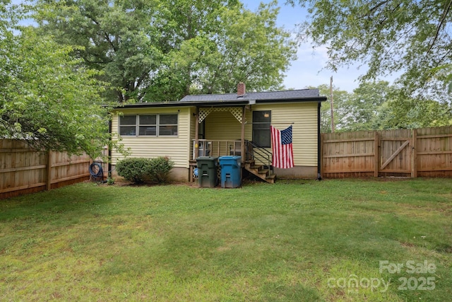 1425 3rd Street Pl NE, Hickory, NC 28601 - back of house featuring a chimney and a gate