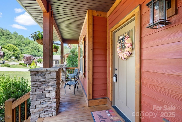 49 S Sundrops Trl, Cullowhee, NC 28723 - property entrance featuring covered porch