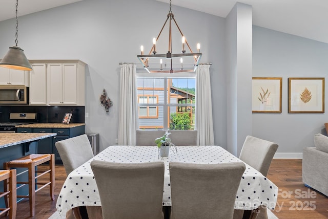 49 S Sundrops Trl, Cullowhee, NC 28723 - dining room with a chandelier, high vaulted ceiling, and wood finished floors