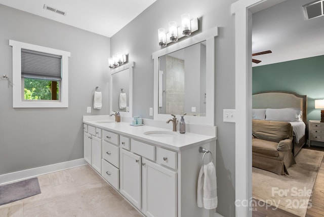 49 S Sundrops Trl, Cullowhee, NC 28723 - ensuite bathroom featuring double vanity and ceiling fan