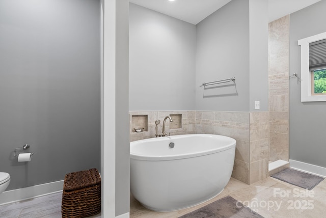 49 S Sundrops Trl, Cullowhee, NC 28723 - bathroom featuring a freestanding bath, tile walls, and a tile shower