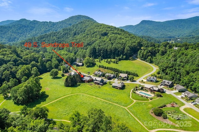 49 S Sundrops Trl, Cullowhee, NC 28723 - drone / aerial view of a heavily wooded area and a mountainous background