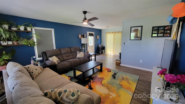 10 Haven Crest Ln, Fletcher, NC 28732 - living area featuring wood finished floors, ceiling fan, and baseboards