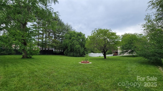 10 Haven Crest Ln, Fletcher, NC 28732 - view of yard featuring an outdoor fire pit