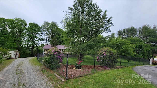 10 Haven Crest Ln, Fletcher, NC 28732 - view of front of home with gravel driveway and an outdoor structure