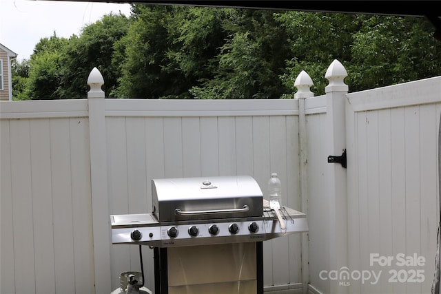 10726 Greenhead View Rd, Charlotte, NC 28262 - view of patio / terrace featuring a grill