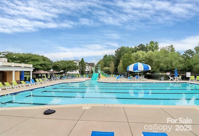 10726 Greenhead View Rd, Charlotte, NC 28262 - community pool featuring a patio area