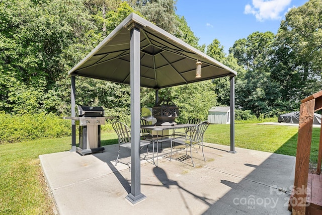 118 Grain Dr, Stony Point, NC 28678 - view of patio / terrace with a gazebo, outdoor dining space, view of scattered trees, and area for grilling