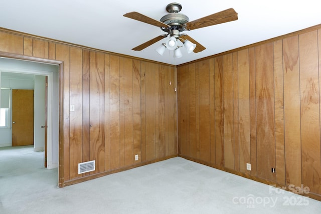 205 Hillcrest Ave, Rock Hill, SC 29732 - carpeted spare room featuring wooden walls and a ceiling fan