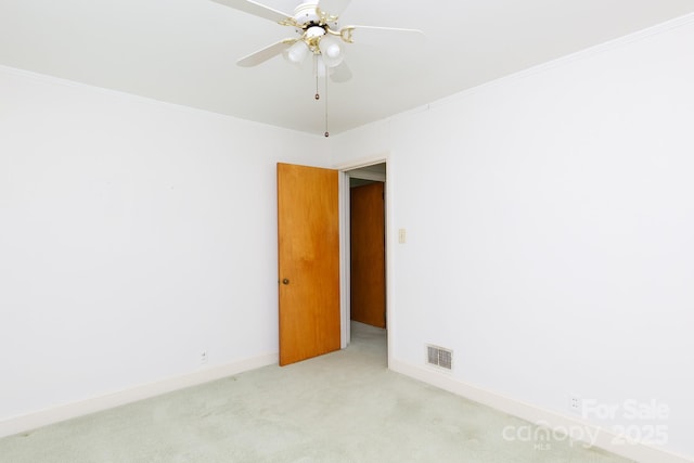 205 Hillcrest Ave, Rock Hill, SC 29732 - spare room featuring light carpet, ornamental molding, ceiling fan, and baseboards
