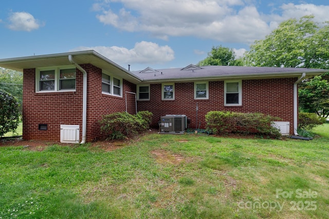 205 Hillcrest Ave, Rock Hill, SC 29732 - back of house with brick siding, a yard, central air condition unit, and crawl space