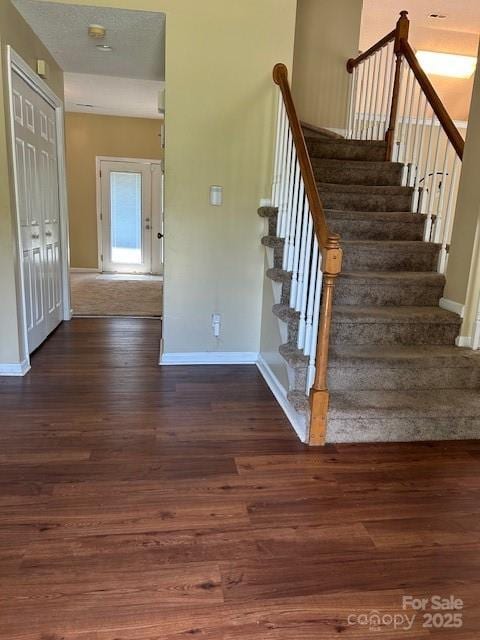 8901 Clifton Meadow Dr, Matthews, NC 28105 - stairs featuring baseboards and wood finished floors