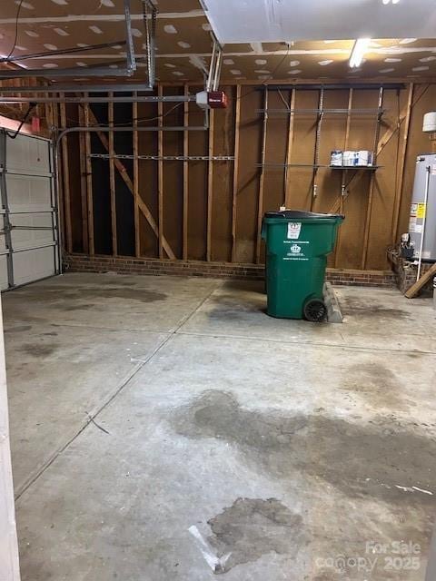 8901 Clifton Meadow Dr, Matthews, NC 28105 - garage featuring gas water heater and a garage door opener
