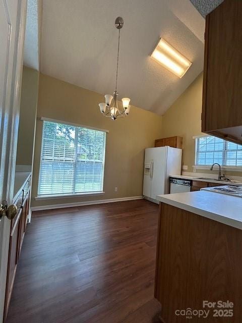 8901 Clifton Meadow Dr, Matthews, NC 28105 - kitchen featuring white refrigerator with ice dispenser, dishwasher, dark wood-style flooring, a chandelier, and light countertops