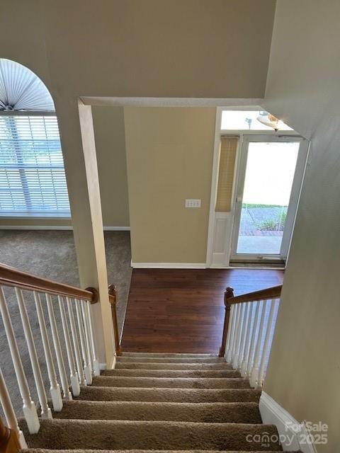 8901 Clifton Meadow Dr, Matthews, NC 28105 - stairs with wood finished floors and carpet