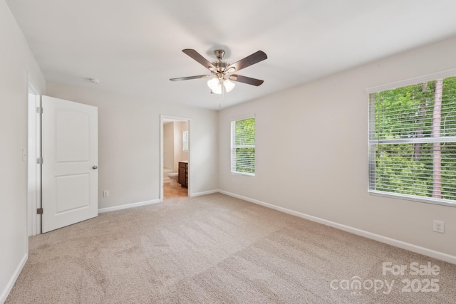 3107 Riker St, Clover, SC 29710 - unfurnished bedroom featuring carpet, baseboards, connected bathroom, and ceiling fan
