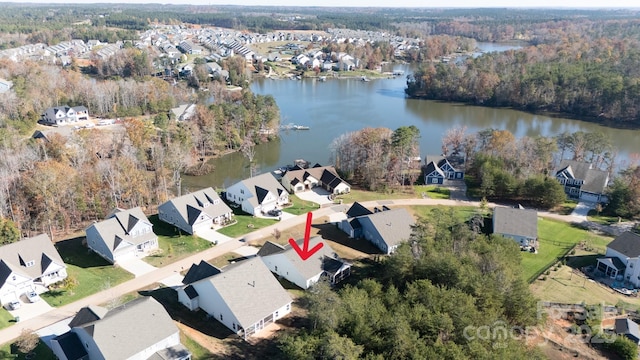 16142 Commodore Dr, Lancaster, SC 29720 - aerial overview of property's location with a nearby body of water, nearby suburban area, and a heavily wooded area