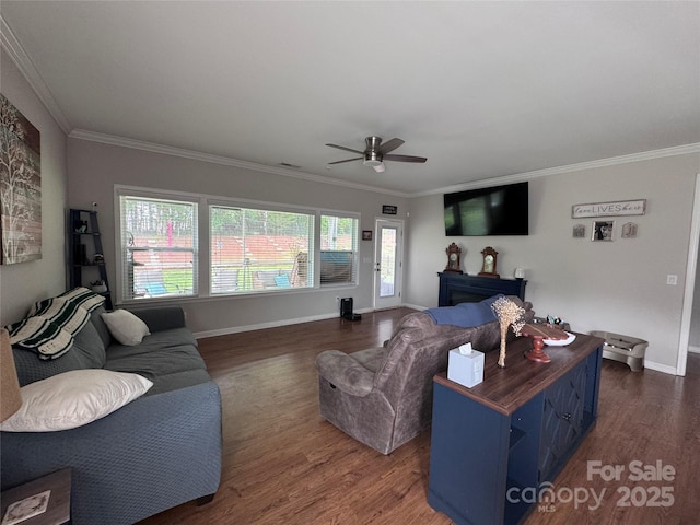 16142 Commodore Dr, Lancaster, SC 29720 - living area with dark wood-type flooring, ceiling fan, crown molding, and baseboards