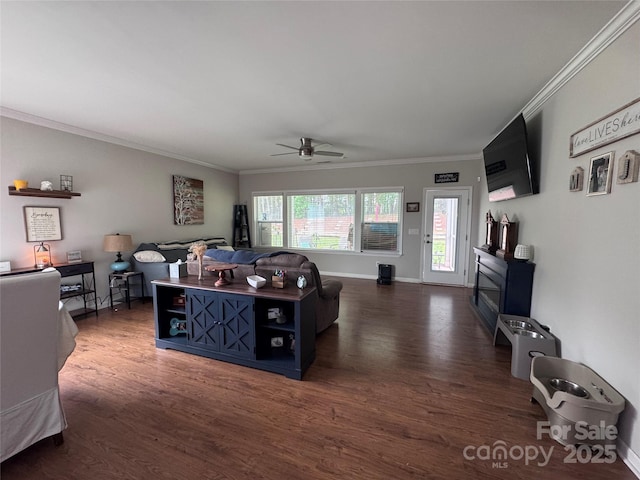 16142 Commodore Dr, Lancaster, SC 29720 - living area featuring dark wood-style floors, ornamental molding, a ceiling fan, and baseboards