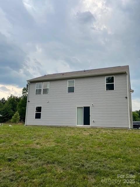 323 J C Dellinger Rd, Cherryville, NC 28021 - rear view of house with a lawn