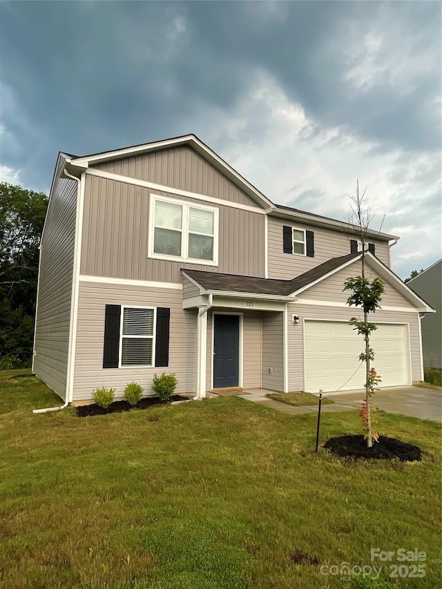 323 J C Dellinger Rd, Cherryville, NC 28021 - traditional-style house with concrete driveway, a front lawn, and an attached garage