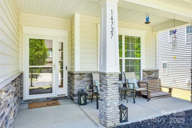 14727 Brannock Hills Dr, Charlotte, NC 28278 - property entrance with covered porch and stone siding