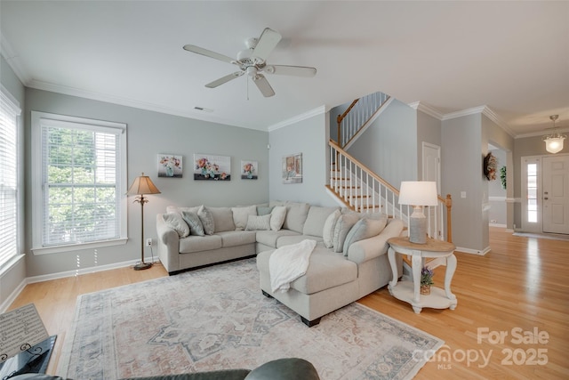 14727 Brannock Hills Dr, Charlotte, NC 28278 - living area with wood finished floors, stairway, baseboards, ornamental molding, and ceiling fan