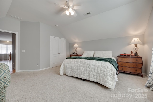14727 Brannock Hills Dr, Charlotte, NC 28278 - carpeted bedroom with vaulted ceiling, baseboards, ceiling fan, and a closet