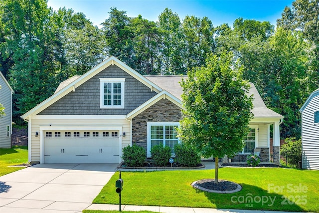 14727 Brannock Hills Dr, Charlotte, NC 28278 - craftsman-style home featuring stone siding, driveway, and a front yard