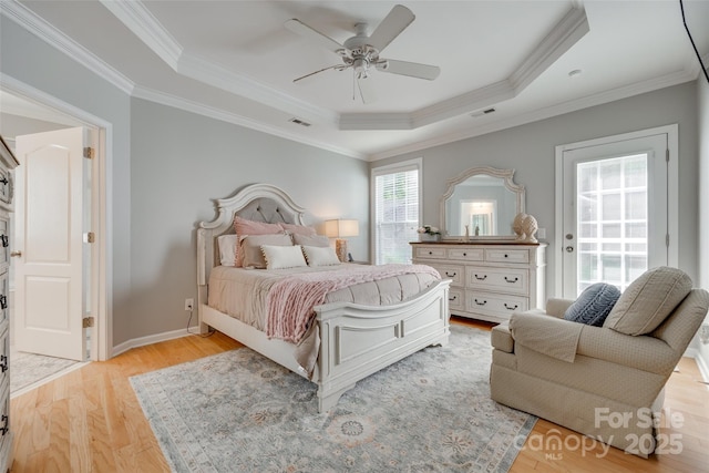 14727 Brannock Hills Dr, Charlotte, NC 28278 - bedroom with a raised ceiling, light wood-type flooring, crown molding, and a ceiling fan