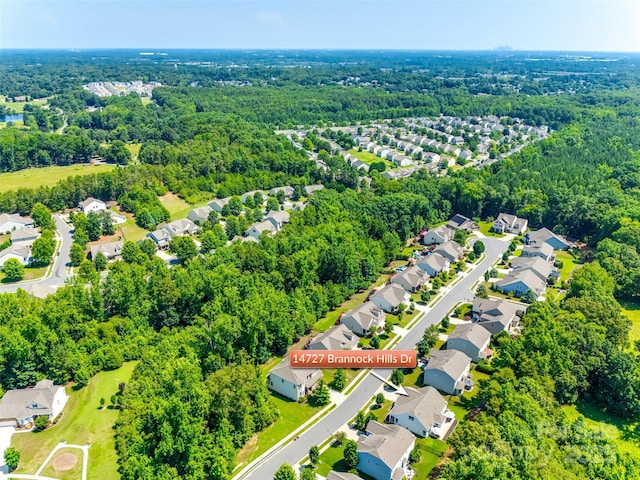 14727 Brannock Hills Dr, Charlotte, NC 28278 - aerial perspective of suburban area with a heavily wooded area