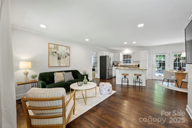 6938 Wrentree Dr, Charlotte, NC 28210 - living room featuring crown molding, recessed lighting, and dark wood-type flooring