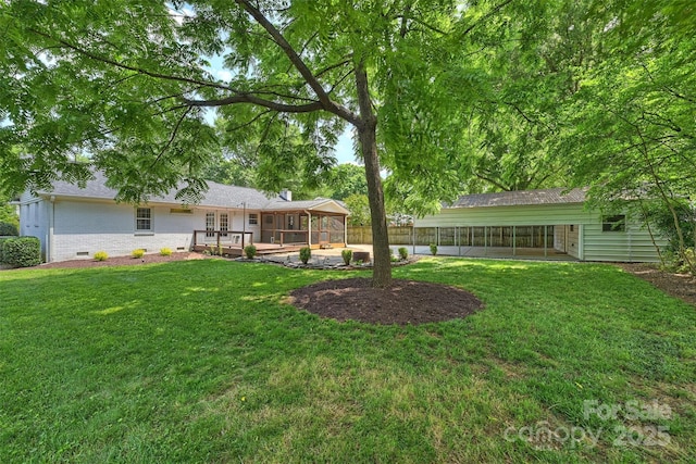 6938 Wrentree Dr, Charlotte, NC 28210 - view of yard featuring a sunroom, a deck, and a patio area