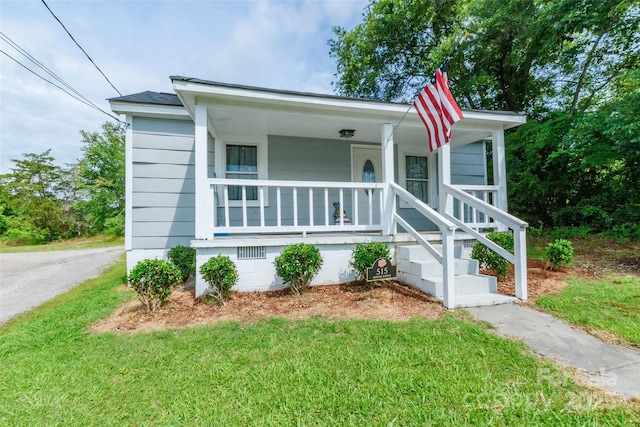 515 Myrtle Ave, Chester, SC 29706 - view of front of house with covered porch, a front lawn, and crawl space