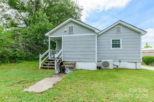 515 Myrtle Ave, Chester, SC 29706 - back of property featuring a cooling unit and a lawn