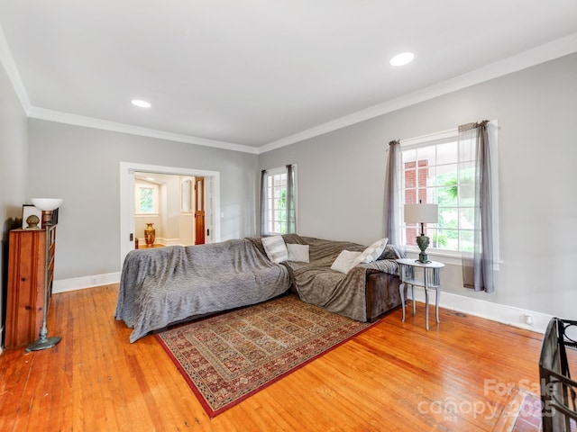 128 W End St, Chester, SC 29706 - living area featuring baseboards, light wood-style flooring, crown molding, and recessed lighting