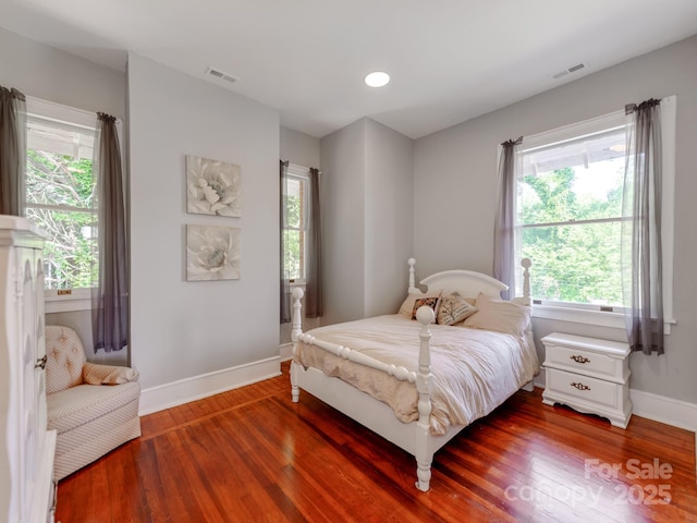 128 W End St, Chester, SC 29706 - bedroom with baseboards and wood finished floors