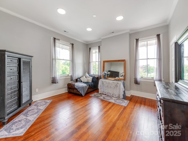 128 W End St, Chester, SC 29706 - living room featuring healthy amount of natural light, baseboards, wood-type flooring, recessed lighting, and crown molding