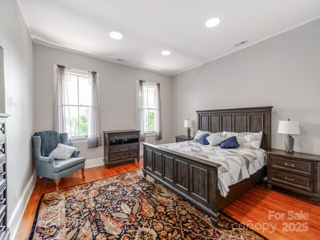 128 W End St, Chester, SC 29706 - bedroom with light wood-type flooring, baseboards, and recessed lighting
