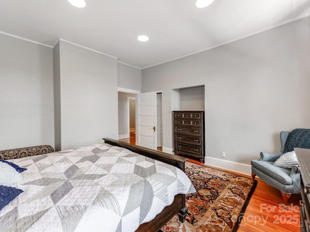 128 W End St, Chester, SC 29706 - bedroom with wood finished floors, crown molding, recessed lighting, and baseboards