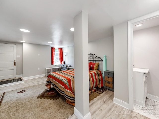 128 W End St, Chester, SC 29706 - bedroom with light wood-style floors, baseboards, and recessed lighting