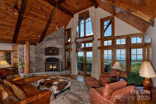 610 Rocky Pkwy Unit 52, 47A, Banner Elk, NC 28604 - living area featuring wood ceiling with exposed beams, high vaulted ceiling, a fireplace, and wood finished floors