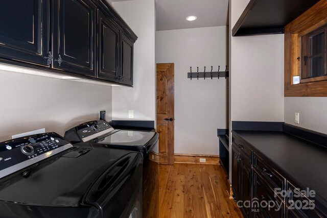 610 Rocky Pkwy Unit 52, 47A, Banner Elk, NC 28604 - laundry area featuring washer and dryer, cabinet space, light wood-style flooring, and recessed lighting