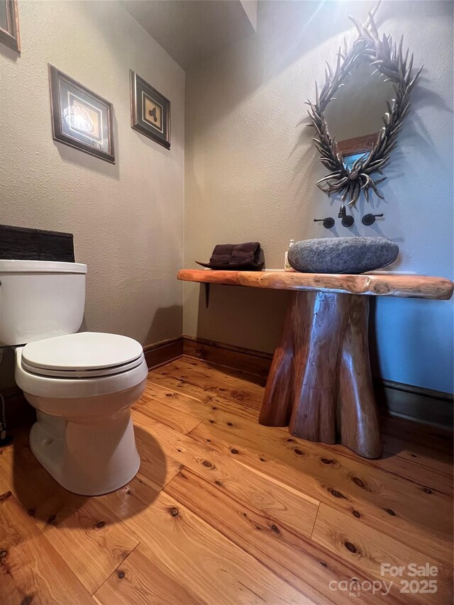 610 Rocky Pkwy Unit 52, 47A, Banner Elk, NC 28604 - bathroom with wood finished floors, toilet, and baseboards