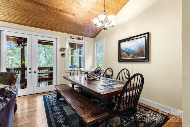 172 Juneberry Ln, Tuckasegee, NC 28783 - dining space featuring wooden ceiling, vaulted ceiling, french doors, a chandelier, and light wood-type flooring