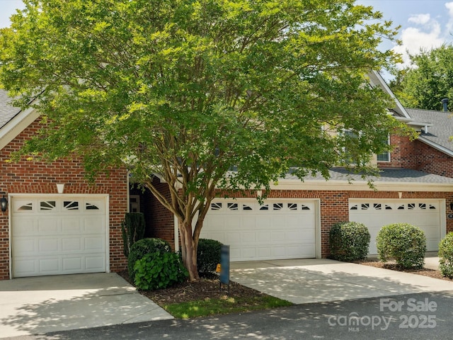 705 Congressional Ln, Fort Mill, SC 29708 - view of front facade with brick siding, a garage, and concrete driveway