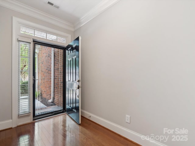 705 Congressional Ln, Fort Mill, SC 29708 - foyer entrance with wood finished floors, baseboards, and crown molding